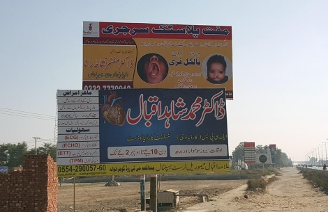 billboard offering free cleft surgery